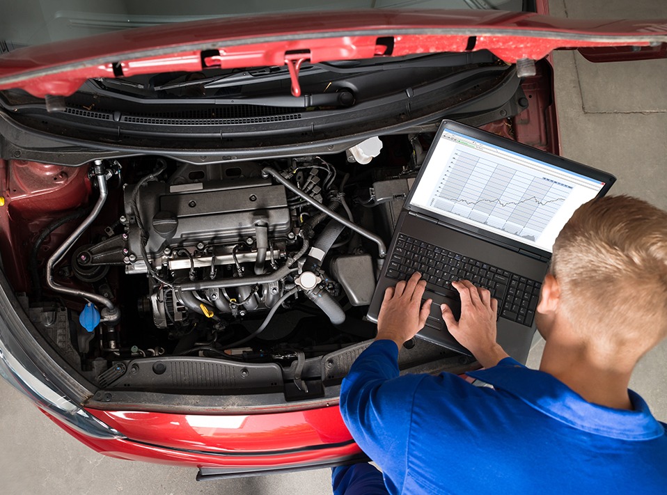 Mechanic checking a diagnostics test - Car Diagnostics Huntingdon